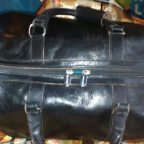roots leather duffle bag